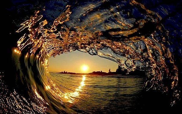  Photo of sunset from inside a surf wave